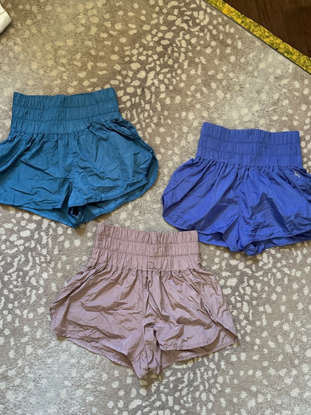 Three pair FP Movement high waisted lined shorts. Medium.